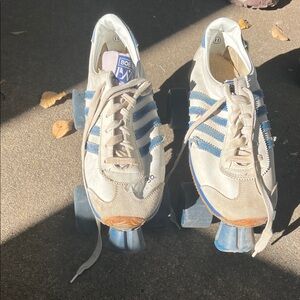 Vintage Roller Skates with Blue Stripes